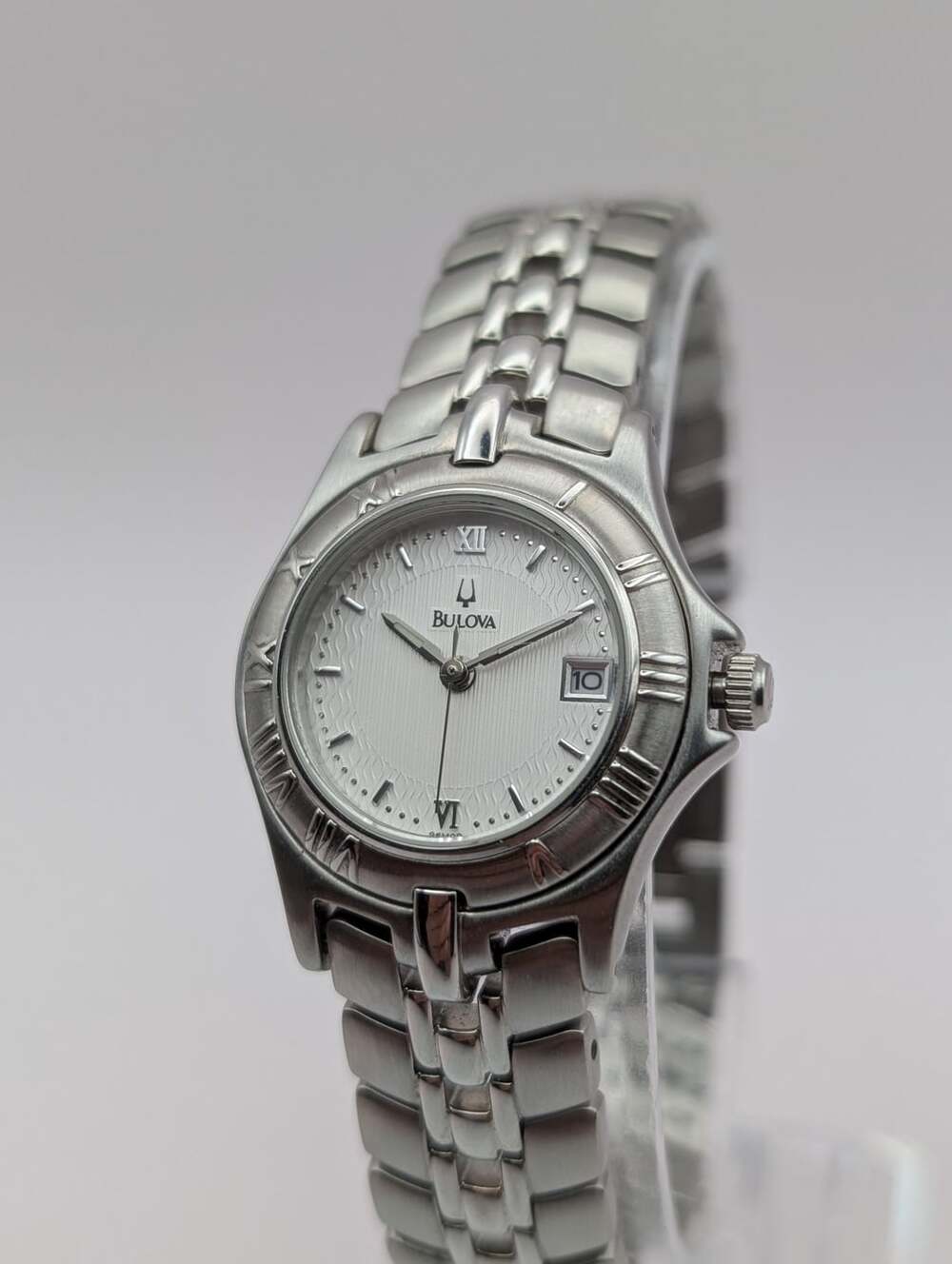 Vintage Bulova Silver-Tone Quartz Ladies Watch, Textured Dial Integrated Bracele
